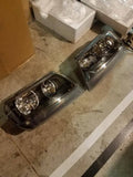 99-04 Jeep Grand Cherokee Head Lights (Black)